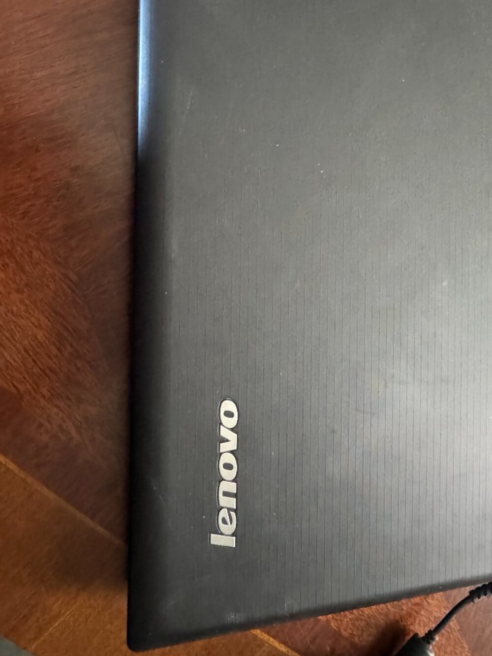 Black Lenovo Factory reset Laptop with charging cord